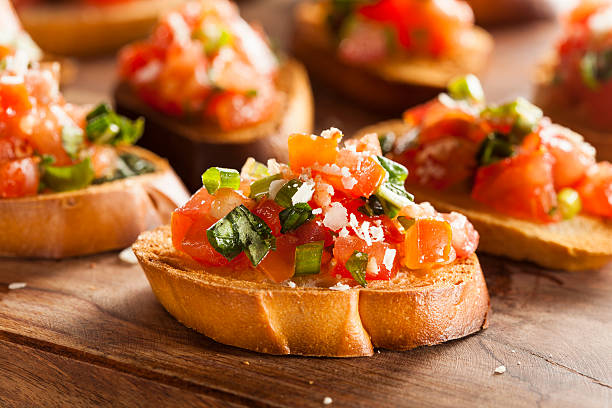 homemade italian bruschetta appetizer with basil and tomatoes